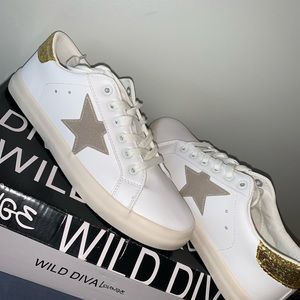 super cute star shoes. never worn.